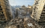  A photograph shows the site of an overnight Israeli airstrike that targeted the Haret Hreik neighbourhood of Beirut's southern suburbs on March 14, 2026.