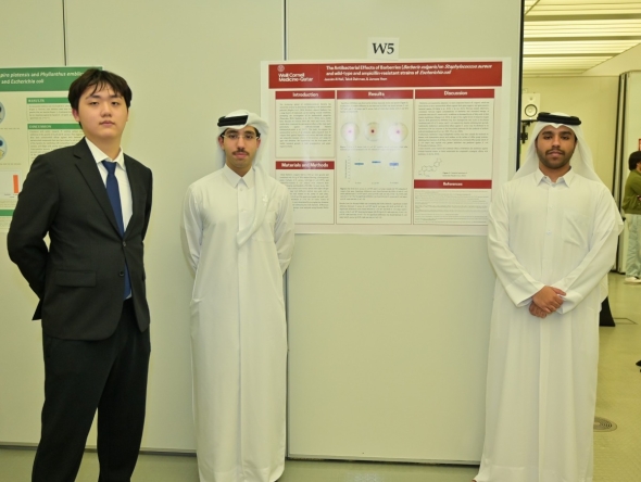 From left:  Students Junseo Yoon, Jassim Al Hail, and Taleb Dahman during the poster presentation event.
