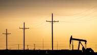 A pump jack is seen at sunset in Midland, Texas, US.