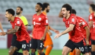 Al Rayyan players celebrate their victory against Umm Salal in the QSL Cup semi-final. 