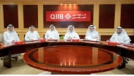 Chairman of the Board of Directors of QIIB Sheikh Dr. Khalid bin Thani bin Abdullah Al-Thani, CEO of QIIB Dr. Abdulbasit Ahmed A Al-Shaibei with other officials during the Ordinary General Assembly meeting.