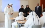 Undersecretary of the Ministry of Education and Higher Education H E Dr. Ibrahim bin Saleh Al-Nuaimi interacts with students in a classroom during his visit to a school.