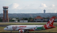 (Files) An AirAsia Airbus A320 passenger aircraft taxis after landing at the I Gusti Ngurah Rai International Airport in Bali on January 21, 2024. (Photo by David Gannon / AFP)