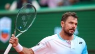Switzerland's Stanislas Wawrinka reacts to a point against Argentinia's Sebastian Baez during the Monte Carlo ATP Masters Series Tournament round of 64 tennis match on Court Rainier III at the Monte-Carlo Country Club in Roquebrune-Cap-Martin, south-eastern France on April 6, 2026. (Photo by Valery HACHE / AFP)