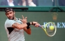 Italy’s Matteo Berrettini plays a backhand return to Russia’s Daniil Medvedev.
