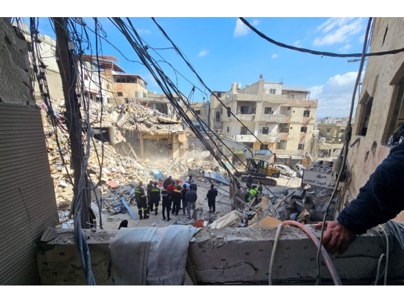 Workers clear rubble from the site of an Israeli airstrike the day before that targeted the Bir Hassan neighbourhood in Beirut's southern suburbs on April 9, 2026. (Photo by AFP)
