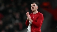 Liverpool's Scottish defender #26 Andrew Robertson applauds the fans following the UEFA Champions League football match between Liverpool and Qarabag at Anfield in Liverpool, north west England on January 28, 2026. Photo by Paul ELLIS / AFP