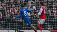 Bournemouth's English midfielder #08 Alex Scott (L) celebrates as he scores his team's second goal during the English Premier League football match between Arsenal and Bournemouth at the Emirates Stadium in London on April 11, 2026. (Photo by Glyn KIRK / AFP)
