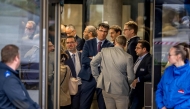 Lawyers wait to enter the room for the hearing of the Mayor of Crans-Montana Nicolas Feraud as part of the investigation over the fire that broke out in the 