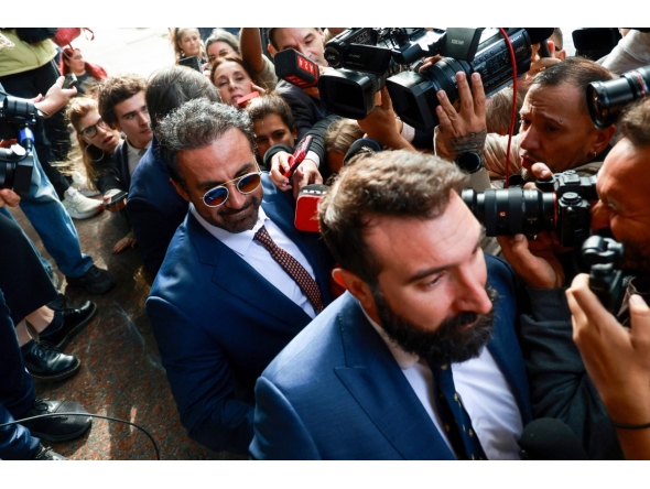 Argentine football legend Diego Maradona's former medical doctor Leopoldo Luque arrives at courthouse for a preliminary hearing in a trial over his death in San Isidro, outskirts of Buenos Aires on April 14, 2026. (Photo by Tomas CUESTA / AFP)