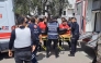 This handout photograph taken and released on April 15, 2026 by Turkish news agency DHA (Demiroren News Agency) shows first aid officers carrying a body bag in Kahramanmaras, southern Turkiye. Photo by HANDOUT / DHA (Demiroren News Agency) / AFP