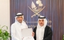 Minister of Justice and Minister of State for Cabinet Affairs  H E Ibrahim bin Ali Al-Mohannadi with a lawyer. 
