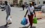 Senegal football supporters walk with their personal belongings after being released from Al Arjat 2 prison in Sale on April 18, 2026.(Photo by Abdel Majid BZIOUAT / AFP)
 