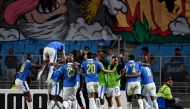 Sundowns' players celebrate after scoring their first goal during the CAF Champions League semi-final first leg football match between Esperance Sportive de Tunis (TUN) and Mamelodi Sundowns (RSA) at the Hammadi Agrebi Stadium in Rades on April 12, 2026. (Photo by FETHI BELAID / AFP)