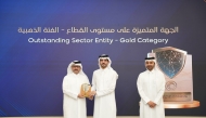 An Aspire Zone representative receiving the award.