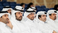 Minister of Justice and Minister of State for Cabinet Affairs H E Ibrahim bin Ali Al Mohannadi (centre) and other officials during the honouring ceremony.