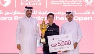 Qatar Chess Association President Mohammed Al-Mudahka (right) with first-place winner, India’s Albin Sajan.