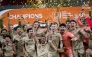 Al Rayyan players celebrate with the trophy after beating Al Shabab in the final.