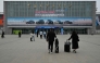 People visit the Beijing Auto Show on its opening day in Beijing on April 24, 2026. (Photo by Adek Berry / AFP)