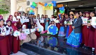  Principal MES Indian School Dr Hameeda Kadar with students and teachers during the event.
