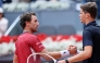 Belgium's Alexander Blockx shakes hands with Norway's Casper Ruud after beating him during their 2026 ATP Tour Madrid Open tennis tournament quarter-final singles match at the Caja Magica in Madrid, on April 30, 2026. (Photo by Thomas COEX / AFP)
