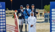 The podium winners of the Silver Tour pose with Deputy Director of the tournament Saeed Hamad Al-Rashdi.
