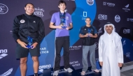 Director of Communications and Public Relations at Aspire Zone Foundation Hamad Yousef Al Obaidly with some of the winners during the awards ceremony. 