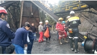 This handout picture released by the Cundinamarca Fire Department shows firefighters inspecting the site of an explosion at a coal mine in Sutatausa, Cundinamarca department, Colombia on May 4, 2026.
 Photo by Handout / Cundinamarca Fire Department / AFP