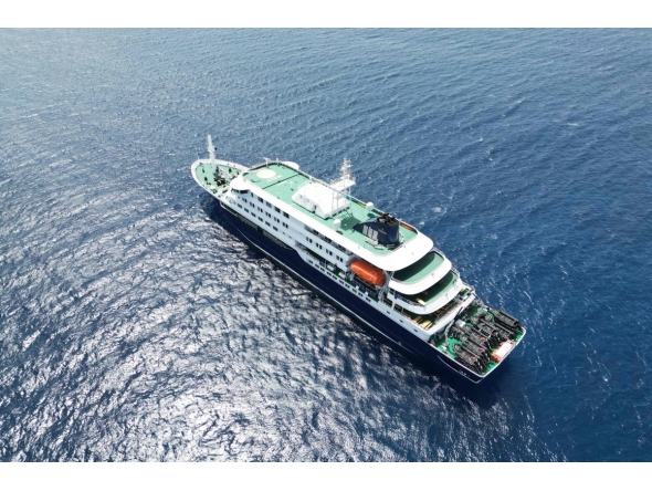This aerial picture shows a general view of the cruise ship MV Hondius stationary off the port of Praia, the capital of Cape Verde, on May 4, 2026. Photo by AFP