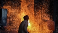 A labourer works at an iron factory in Lahore on April 30, 2026. (Photo by Arif ALI / AFP)
