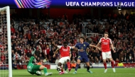 Arsenal's English midfielder #07 Bukayo Saka scores the team's first goal during the UEFA Champions League second-leg semi-final football match between Arsenal and Atletico Madrid at the Emirates Stadium in north London on May 5, 2026. (Photo by Adrian Dennis / AFP)