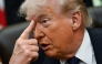 US President Donald Trump gestures as he speaks in the Oval Office of the White House in Washington, DC on May 5, 2026. (Photo by Kent Nishimura / AFP)
