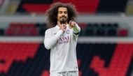 Akram Afif celebrates after scoring.