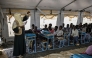 Displaced Sudanese students attend a class at an elementary school, south of Port Sudan, on April 26, 2026. Photo by Khaled Desouki / AFP
