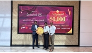 Shumalan Naicker, Senior Vice President & Country Head, Landmark Group Qatar; Rajgopal, Associate General Manager – Marketing, Landmark Group Qatar; with winner.