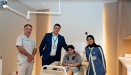 Sidra Medicine team with the young patient. 