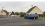 This screengrab made from an AFP video shows a gendarmerie car parked in a street in Fere-en-Tardenois, northern France. (Photo by Noorullah Shirzada / AFP)