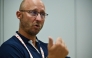 This photo taken on August 23, 2022 shows Badminton World Federation (BWF) secretary general Thomas Lund of Denmark speaking during an interview with AFP on the sidelines of the Badminton World Championships in Tokyo. Photo by Richard A. Brooks / AFP