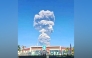 A handout picture taken and released by Indonesia's disaster mitigation agency (BNPB) on May 8, 2026, shows smoke rising from the eruption of Mount Dukono as seen from Tobelo, North Maluku. AFP PHOTO / Indonesia DISASTER MITIGATION AGENCY
