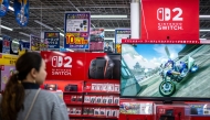 A customer visits the gaming section for Nintendo products at a shop in Tokyo on May 7, 2026. (Photo by Philip Fong / AFP)