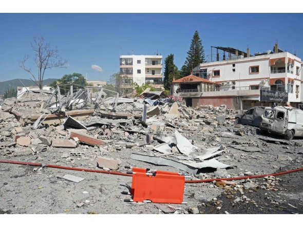 A view of destroyed buildings is pictured at the site of an Israeli airstrike that targeted the southern Lebanese village of Habbouch on May 7, 2026. (Photo by Abbas Fakih / AFP)