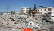 A view of destroyed buildings is pictured at the site of an Israeli airstrike that targeted the southern Lebanese village of Habbouch on May 7, 2026. (Photo by Abbas Fakih / AFP)
