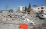 A view of destroyed buildings is pictured at the site of an Israeli airstrike that targeted the southern Lebanese village of Habbouch on May 7, 2026. (Photo by Abbas Fakih / AFP)