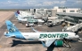 (FILES) Frontier Airlines planes are parked at gates in Denver International Airport (DEN) in Denver, Colorado, on August 5, 2023. (Photo by Daniel SLIM / AFP)
