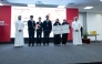 First place wining team with the officials during the award ceremony.