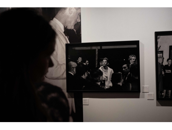 A woman looks at a picture taken by Turkish photojournalist Ara Guler during the Cannes Film Festival at the Ara Guler Museum in Istanbul, on May 7, 2026. (Photo by Ozan Kose / AFP)