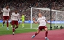 Arsenal's Belgian midfielder Leandro Trossard celebrates scoring the team's first goal during the English Premier League football match between West Ham United and Arsenal at the London Stadium, in east London on May 10, 2026. (Photo by Adrian Dennis / AFP) /