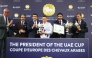The connections of Lacaro Du Croate receive their awards after the Mansoor Khalil M. Al-Shahwani-owned mare won the President of the UAE Cup at ParisLongchamp yesterday.