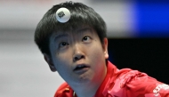 Festivities for table tennis world champion Sun Yingsha's 25th birthday included messages on massive digital billboards, a drone show and packed fan gatherings at shopping malls across the country. (Photo by Glyn Kirk / AFP)
