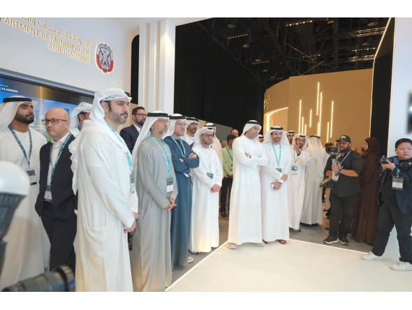 Officials touring exhibitors on the opening day of the summit yesterday. 